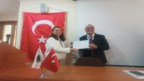 SÖZER AKYILDIRIM ULUSLARARASI TÜRK DÜNYASI VE SOSYAL BİLİMLER SEMPOZYUMUNA KATILDI